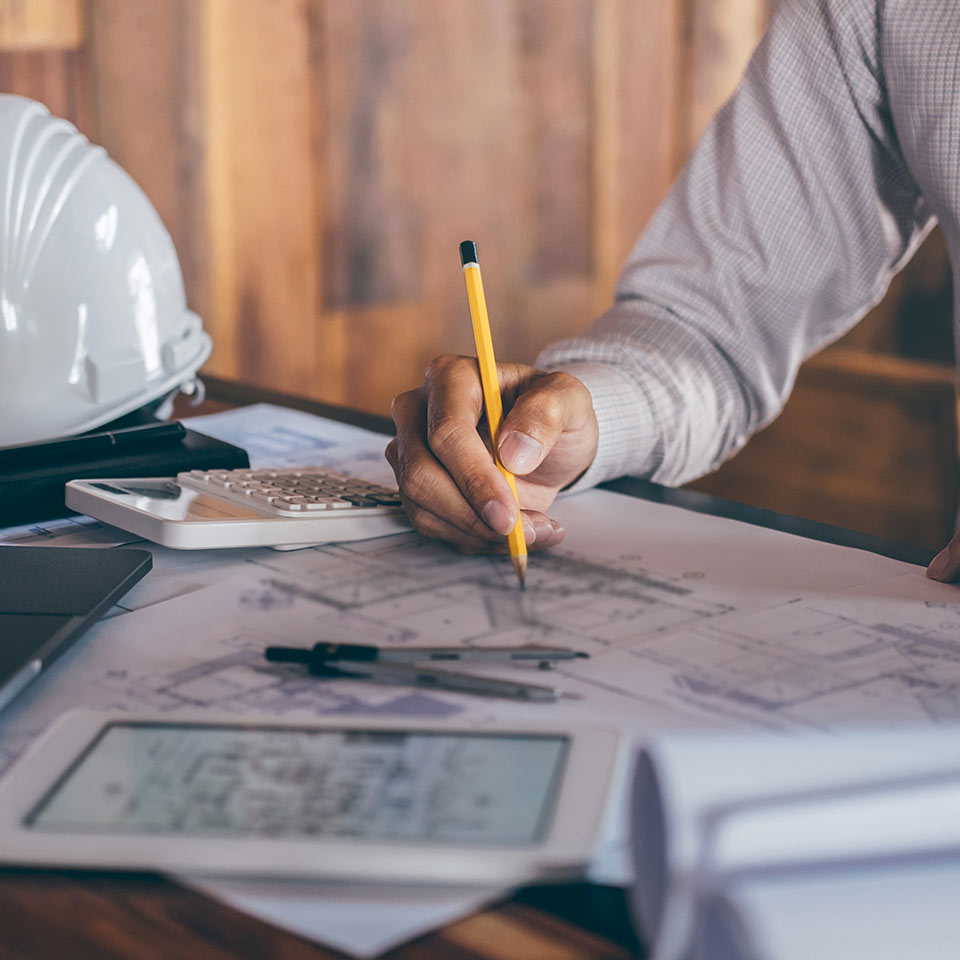 Engineer creating blueprints